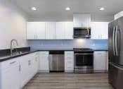 Thumbnail 21 of 29 - Kitchen at Aqua Via Apartments, Oakland, 94607