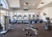 Thumbnail 7 of 39 - 24-Hour State-of-the-Art Fitness Center with Window Walls, Treadmills, Elliptical Machines, and Strength Training Equipment at McDermott Place, Texas 75025