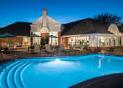Thumbnail 5 of 39 - Resort-Style Swimming Pool with Lounge Seats, Tables, Chairs, and Umbrellas at McDermott Place, Plano
