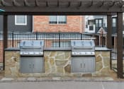 Thumbnail 13 of 39 - Two Stainless Steel Grills under Pergola with Countertop at McDermott Place, Plano, Texas