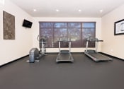 Thumbnail 8 of 60 - Gym with treadmill and eliptical