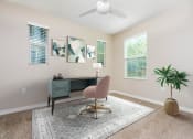 Thumbnail 31 of 60 - a desk with a chair and a plant in a room with beige walls and a ceiling