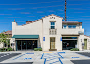 Thumbnail 73 of 83 - A building with a green awning and a sign that reads 2398.