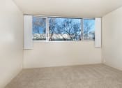 Thumbnail 38 of 86 - unfurnished bedroom with carpet flooring at Avenue Two Apartments, Redwood City  , California