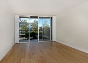 Thumbnail 53 of 86 - jefferson floor plan unfurnished living room and wood plank style flooring at Avenue Two Apartments, Redwood City
