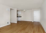 Thumbnail 54 of 86 - jefferson floor plan unfurnished living room and wood plank style flooring at Avenue Two Apartments, Redwood City  , California