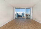 Thumbnail 66 of 86 - seaport unfurnished living room with wood plank style flooring at Avenue Two Apartments, Redwood City  , CA