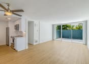 Thumbnail 32 of 86 - brewster unfurnished living room and kitchen at Avenue Two Apartments, Redwood City  ,California, 94063