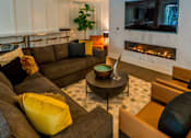 Thumbnail 13 of 29 - Living Area With TV at Baker Block, Costa Mesa, CA, 92626