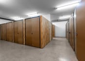 Thumbnail 24 of 50 - a row of wooden wardrobes in a room