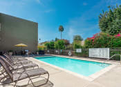 Thumbnail 29 of 50 - Pool with lounge seating