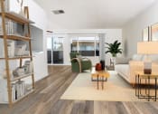 Thumbnail 56 of 77 - the living room of an apartment with a couch and a chair