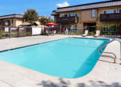 Thumbnail 73 of 77 - our resort style swimming pool is in front of our apartments with a fence