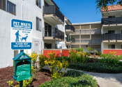 Thumbnail 22 of 36 - an image of an apartment building with a sign for a pet waste facility