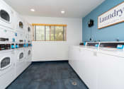 Thumbnail 28 of 36 - Laundry Room