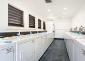 Thumbnail 25 of 77 - laundry room