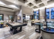 Thumbnail 15 of 62 - resident lounge with pool table and open kitchen at Capriana at Chino Hills, Chino Hills, CA