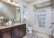 Thumbnail 27 of 62 - furnished bathroom with garden style tub at Capriana at Chino Hills, Chino Hills, CA, 91709