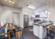 Thumbnail 35 of 62 - furnished kitchen with stainless steel appliances at Capriana at Chino Hills, Chino Hills, CA