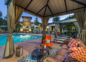 Thumbnail 51 of 62 - resident pool at night with cabana seating at Capriana at Chino Hills, Chino Hills, CA, 91709