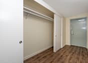 Thumbnail 31 of 127 - A room with a white door and a grey door.
