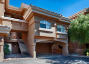 Thumbnail 3 of 18 - cibola exterior of apartment with open garage