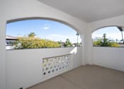 Thumbnail 19 of 48 - A white room with a window and a view of the outdoors.