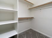 Thumbnail 27 of 48 - A white shelving unit with three shelves is in a room with white walls and a grey carpet.