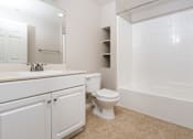 Thumbnail 32 of 80 - a bathroom with a bathtub toilet and sink