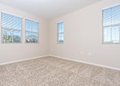 Thumbnail 40 of 80 - a bedroom with three windows