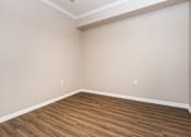 Thumbnail 43 of 80 - an empty room with wood style flooring