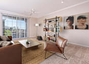 Thumbnail 35 of 80 - a living room with pink walls and a large window