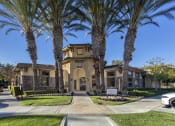 Thumbnail 5 of 25 - a home with palm trees in front of it at 55+ Remington at Ladera Ranch, California, 92694