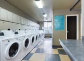 Thumbnail 16 of 86 - avenue two laundry room at Avenue Two Apartments, Redwood City  ,California, 94063
