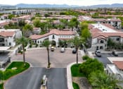Thumbnail 32 of 52 - Aerial view of a neighborhood with houses and cars at Dobson 2222, Chandler, AZ, 85286
