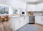 Thumbnail 8 of 52 - Kitchen With White Cabinetry And Appliances at Dobson 2222, Chandler, Arizona