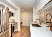 Thumbnail 27 of 33 - furnished kitchen with stainless steel appliances