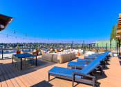Thumbnail 6 of 33 - eastlake rooftop lounge with lounge seating and lake views