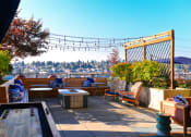 Thumbnail 16 of 33 - rooftop lounge with twinkle lights