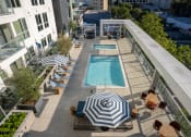 Thumbnail 56 of 89 - an aerial view of the outdoor pool and lounge area at the ace hotel los angeles
