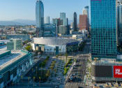 Thumbnail 62 of 89 - an aerial view of the los angeles convention and exhibition center with the city in the background