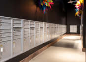 Thumbnail 65 of 89 - a row of lockers in a school hallway