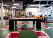 Thumbnail 78 of 89 - a games room with a ping pong table