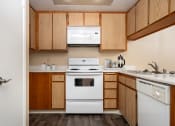 Thumbnail 8 of 36 - Furnished Kitchen at 55+ FountainGlen Goldenwest Senior Apartments, Westminster, CA, 92683