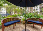 Thumbnail 25 of 36 - Courtyard seating at 55+ FountainGlen Goldenwest, Westminster, CA