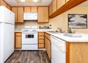 Thumbnail 14 of 36 - Kitchen Model at 55+ FountainGlen Goldenwest Senior Apartments, California