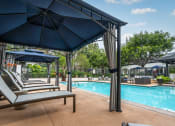 Thumbnail 20 of 36 - Pool cabanas at 55+ FountainGlen Goldenwest Senior Apartments, Westminster, California