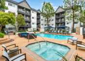 Thumbnail 17 of 36 - Pool and spa at 55+ FountainGlen Goldenwest, Westminster, CA