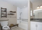 Thumbnail 3 of 36 - renovated apartment bathroom  at 55+ FountainGlen Goldenwest Senior Apartments, Westminster, California