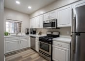 Thumbnail 17 of 23 - Clubhouse kitchen at FountainGlen Pasadena